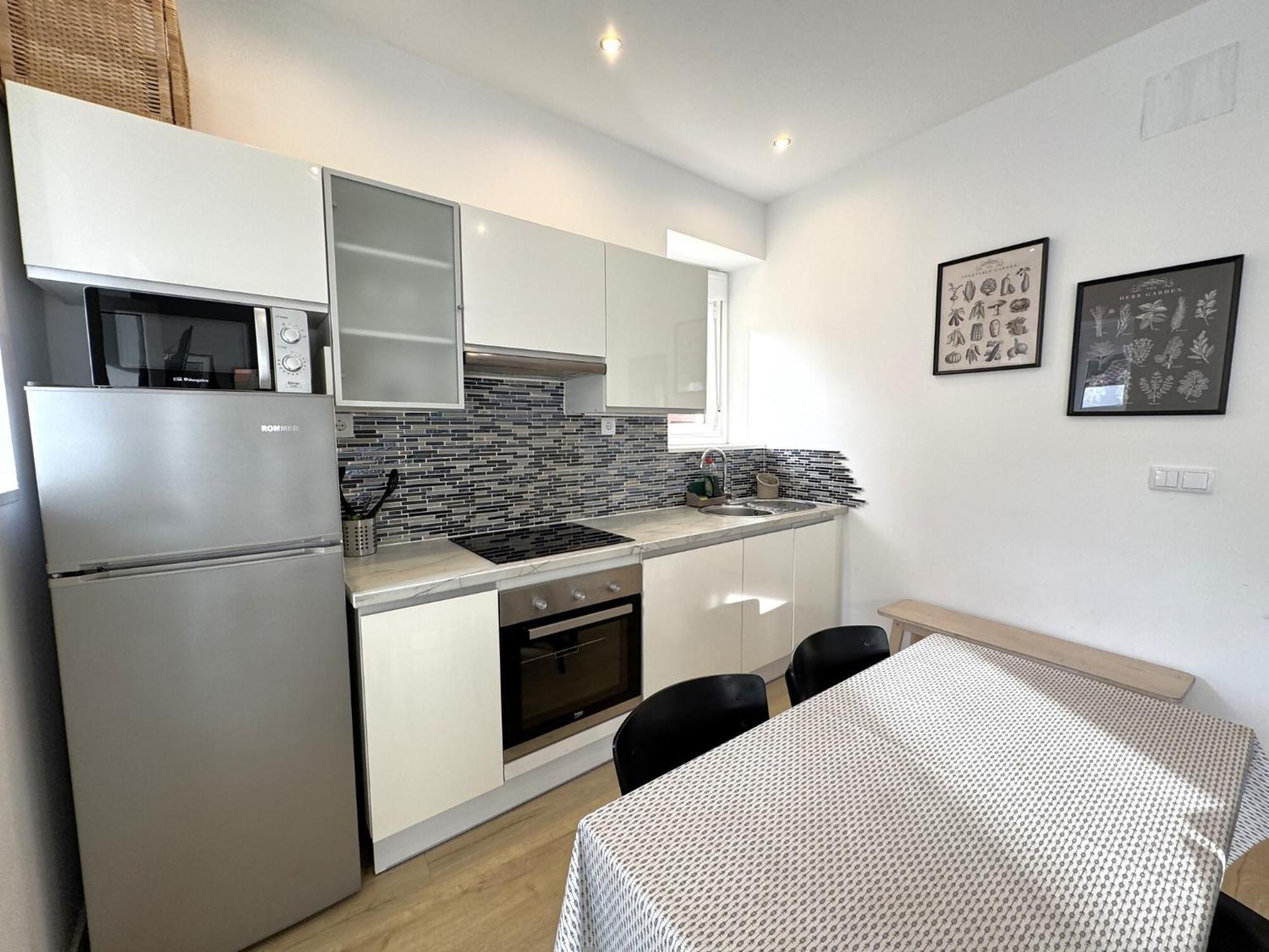 Apartamento Penaquinera En リャネス エクステリア 写真